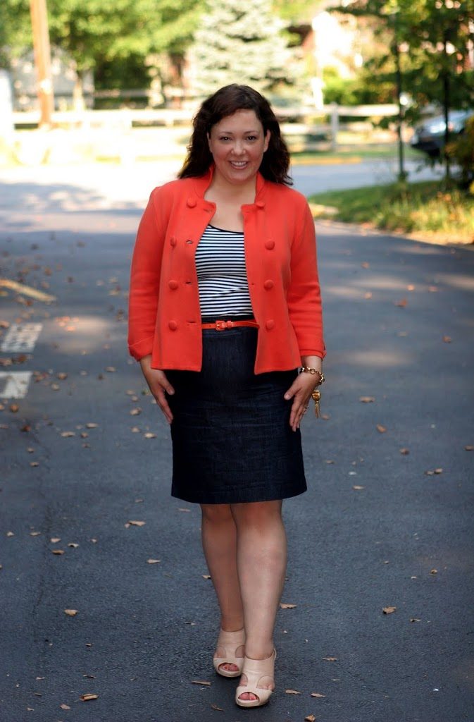 Alison Gary of Wardrobe Oxygen in an orange J. Crew sweater jacket and denim pencil skirt 