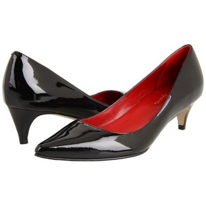 A Pair of Black Shoes with Red Soles