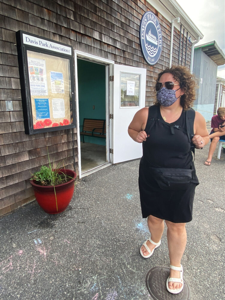 Dagne Dover Dakota Backpack woman at the Davis Park ferry to Fire Island, NY wearing the large Dagne Dover Dakota backpack