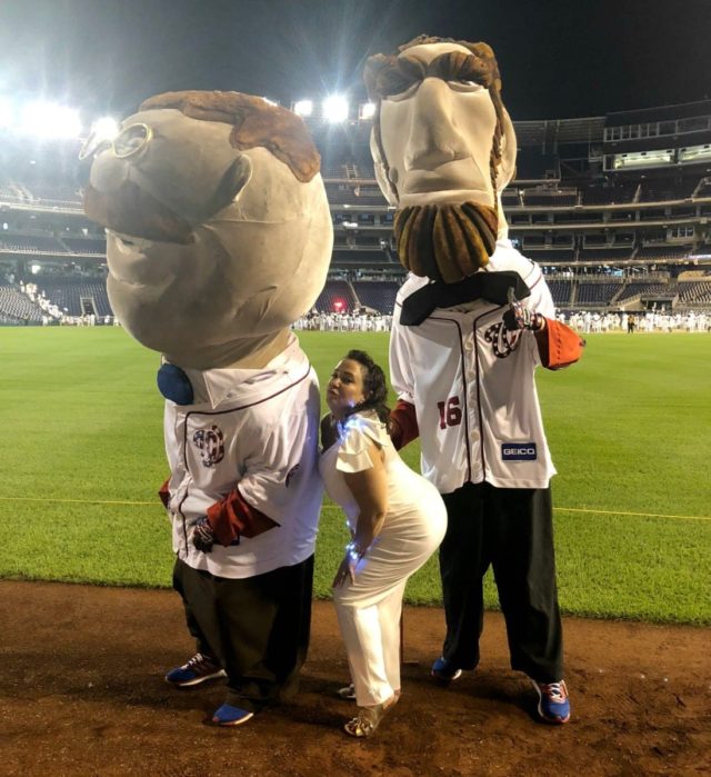 Alison Gary of Wardrobe Oxygen in a white one-shouldered jumpsuit at Diner en Blanc Washington DC 2018 at Nationals Park