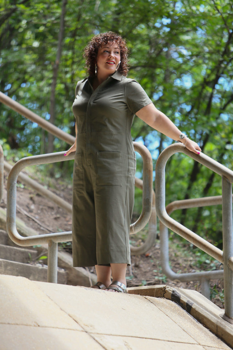 Wardrobe Oxygen in the Universal Standard Kate Twill Jumpsuit in green with silver Birkenstocks and the Jenny Bird Cober Hoops in Silver