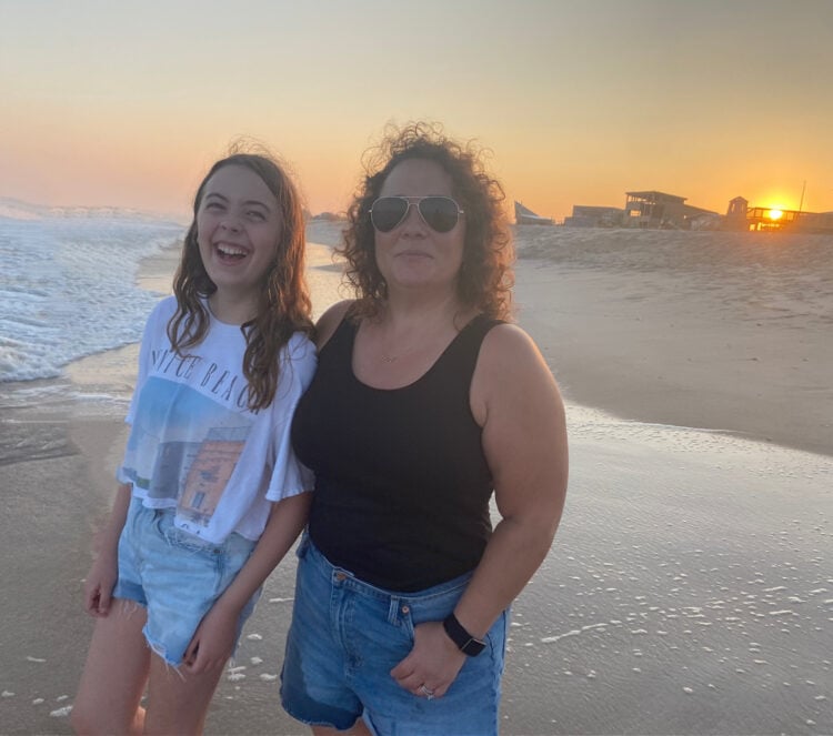Alison Gary of Wardrobe Oxygen and her daughter on the beach of Davis Park, Fire Island, at sunset