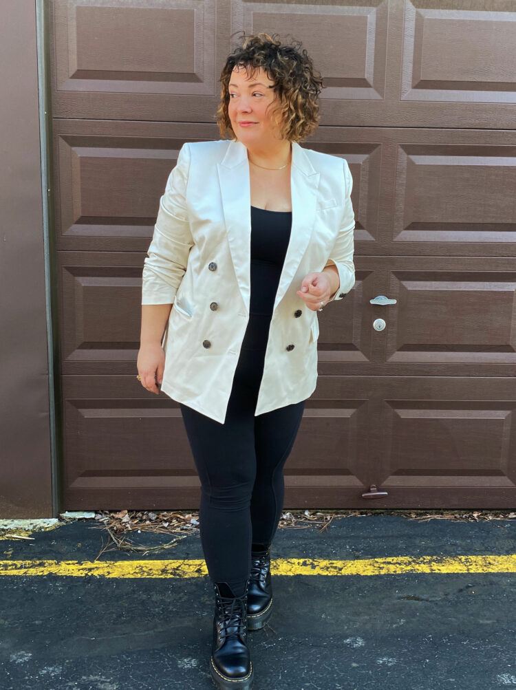 Alison Gary of Wardrobe Oxygen in a tan poplin boyfriend blazer from J. Crew over a black Universal Standard Next to Nothing Bodysuit