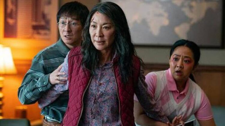 Ke Huy Quan, Michelle Yeoh, and Stephanie Hsu as husband, wife, and daughter in Everything Everywhere All At Once