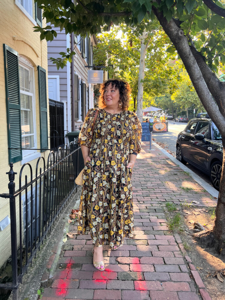 Alison Gary of Wardrobe Oxygen on a brick sidewalk in the Georgetown part of DC wearing a Rebecca Taylor cotton floral midi dress