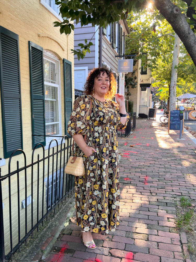 Alison Gary of Wardrobe Oxygen on a brick sidewalk in the Georgetown part of DC wearing a Rebecca Taylor cotton floral midi dress