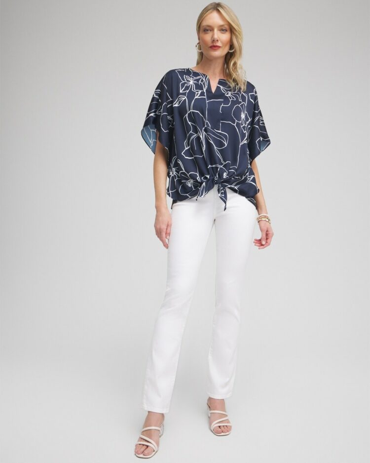 a model wearing Chico's no stain white girlfriend jeans