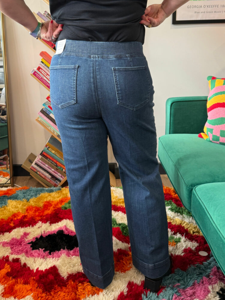 Alison Gary of Wardrobe Oxygen in a black t-shirt tucked into the Talbots Flare Leg Pull-on Travel Jeans