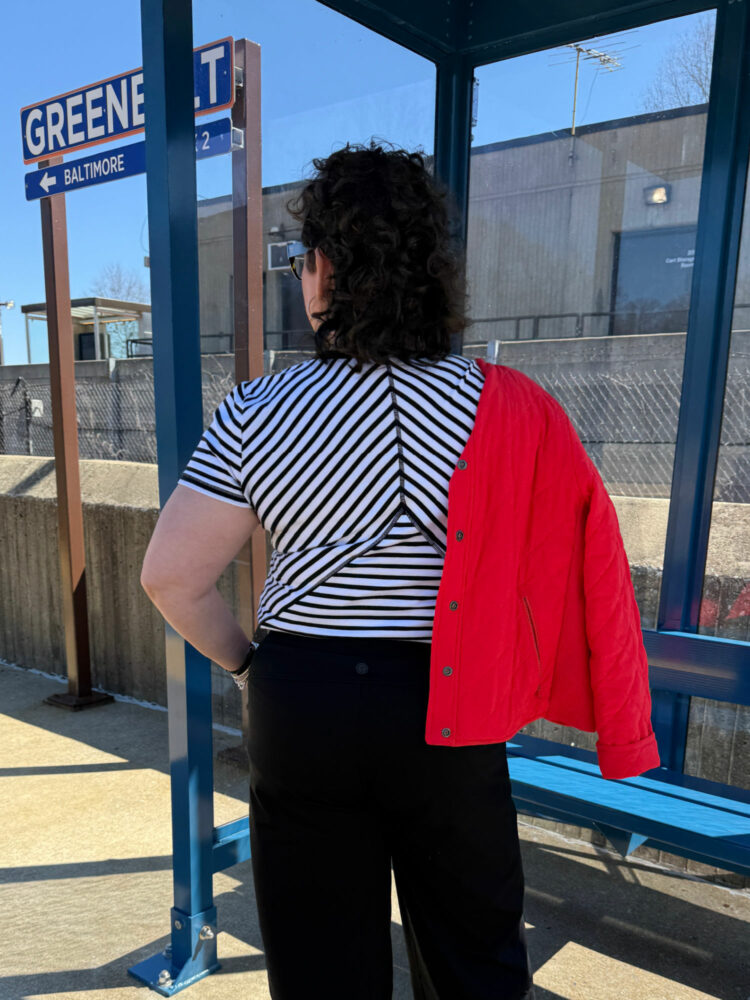 showing the seamed back of the striped shirt in the spring travel capsule wardrobe by talbots 