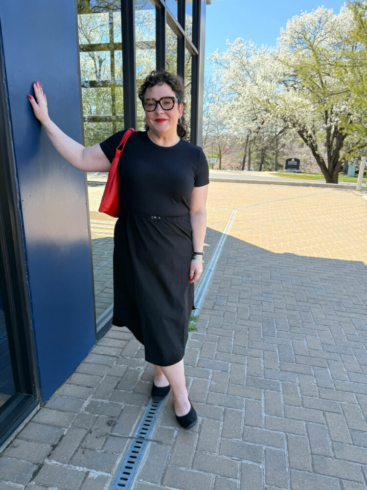 Alison Gary of Wardrobe Oxygen in a black midi length dress from the T by Talbots collection that is part of her spring travel capsule wardrobe with talbots