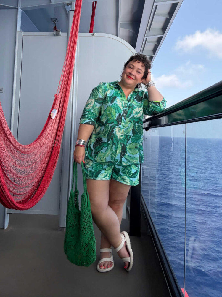 What I Wore on My Virgin Voyages Cruise by Wardrobe Oxygen: woman wearing coordinates with leaves print 