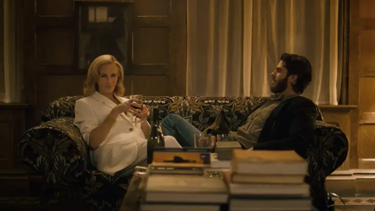 julia roberts and andrew garfield sitting on Alma's sofa at the beginning of After the HHunt