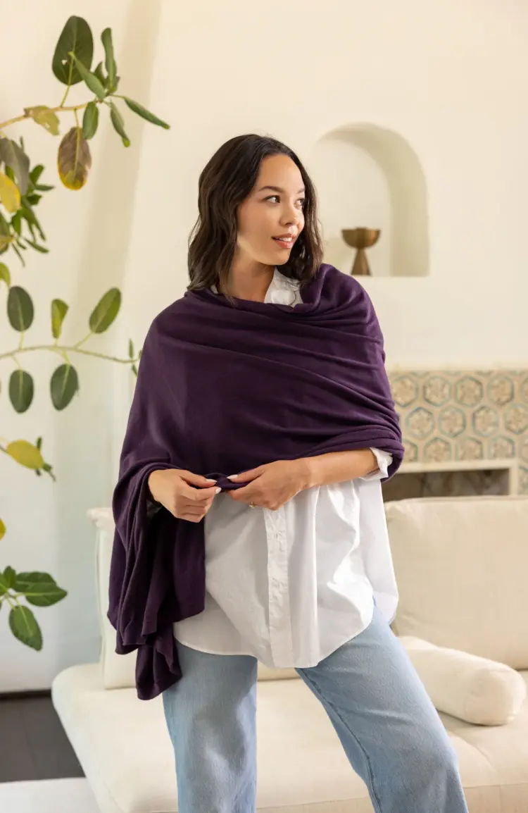 This is what I do before shopping online from a new-to-me company. 10 The Zestt Organics Travel Wrap in Blackberry worn by a model on the company website