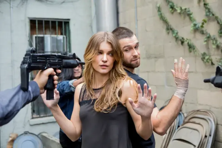Weekend Reads for the End of February 5 carrie and hood being held up in the tv series banshee