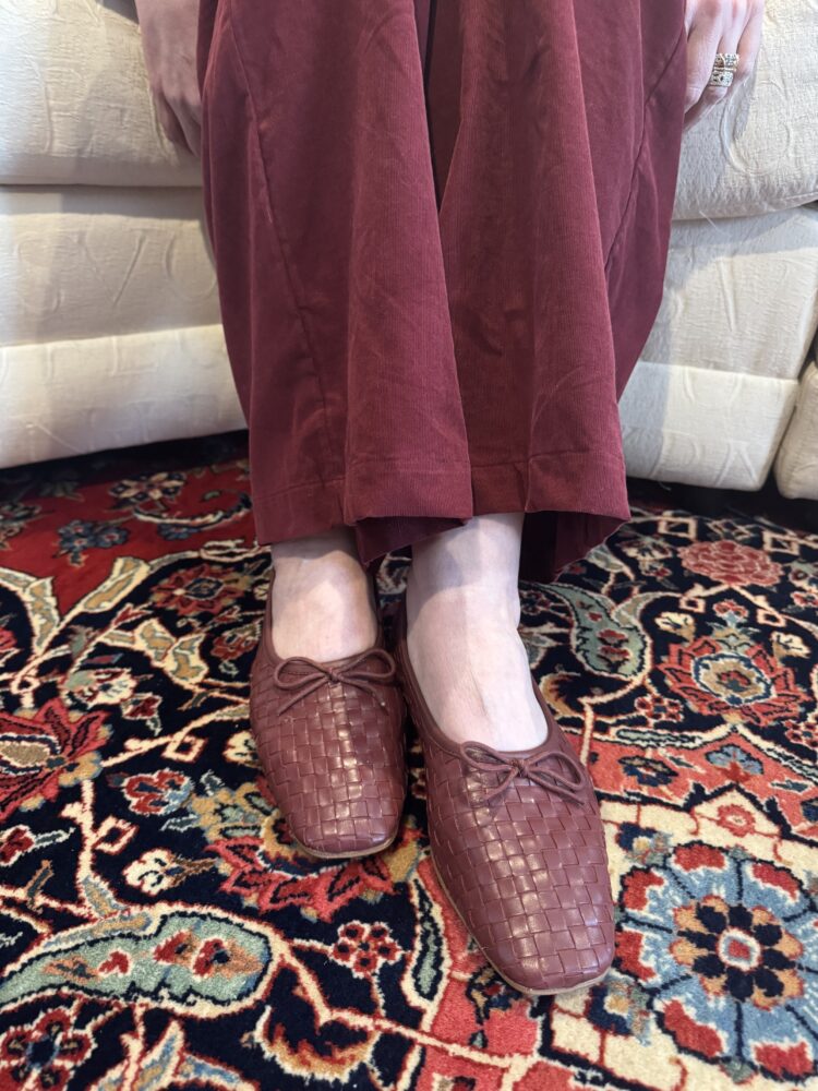 Quince Shoes Review: Italian Leather Boots, Loafers, and Flats Tested by a Real Woman in Her 50s 7 review of quince handwoven loafers seen worn on an over 50 woman