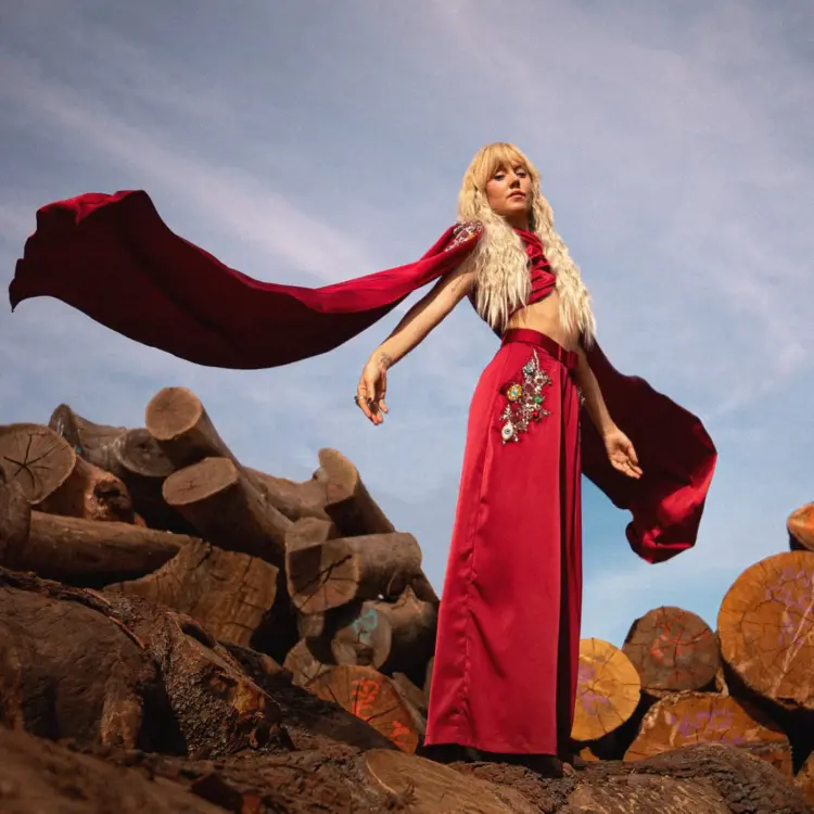 Weekend Reads for the Beginning of March 3 iluka singer in red satin outfit